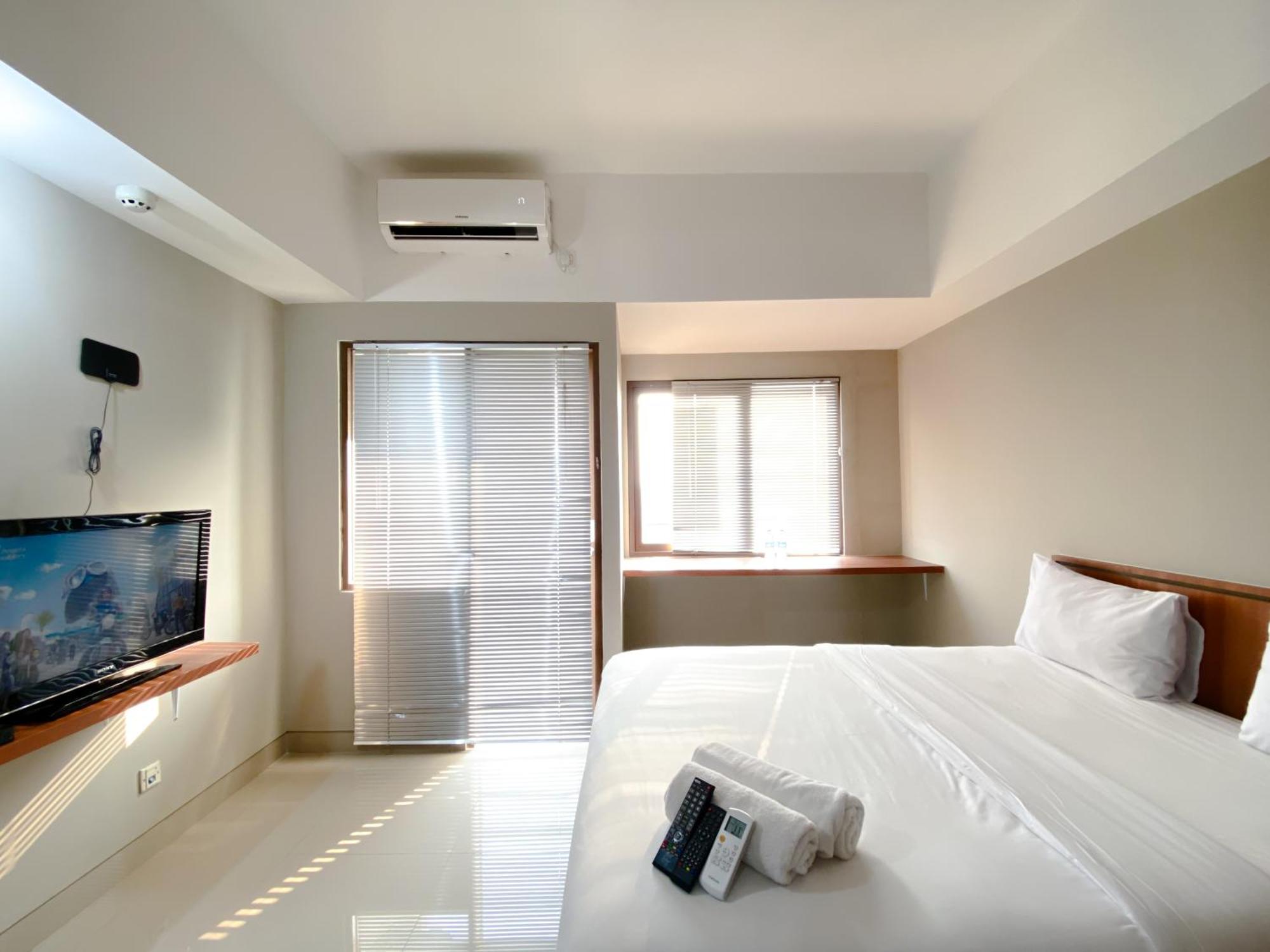 Apartemen Homey And Minimalist Gateway Park Lrt By Travelio Bekasi